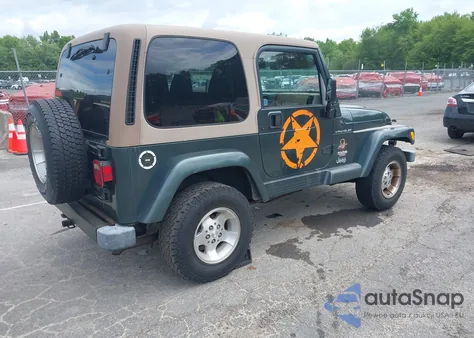 2002 Jeep Wrangler Sahara z USA, uszkodzony, nr VIN 1J4FA59S52P735442